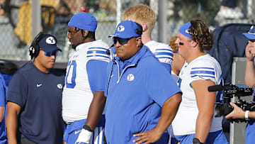 Oct 26, 2024; Orlando, Florida, USA;  Brigham Young Cougars head coach Kalani Sitake looks on in the first half against the Central Florida Knights at FBC Mortgage Stadium. Mandatory Credit: Russell Lansford-Imagn Images