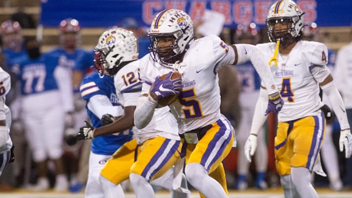 Hattiesburg's Tristen Keys (5) returns for the Tigers during play against Grenada in the MHSAA 6A championship game in Hattiesburg, Miss., Saturday, Dec. 7, 2024.