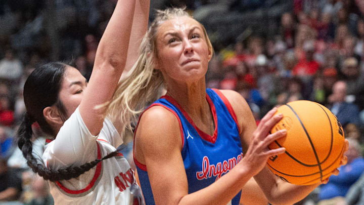 Ingomar's Macie Phifer (14) goes for two past New Site's Brooklyn Hodum (11) during the MHSAA Class 2A girls basketball tournament championship Jackson, Miss., Friday, March 1, 2024. Ingomar's Macie Phifer (14) goes for two past New Site's Brooklyn Hodum (11) during the MHSAA Class 2A girls basketball tournament championship Jackson, Miss., Friday, March 1, 2024.