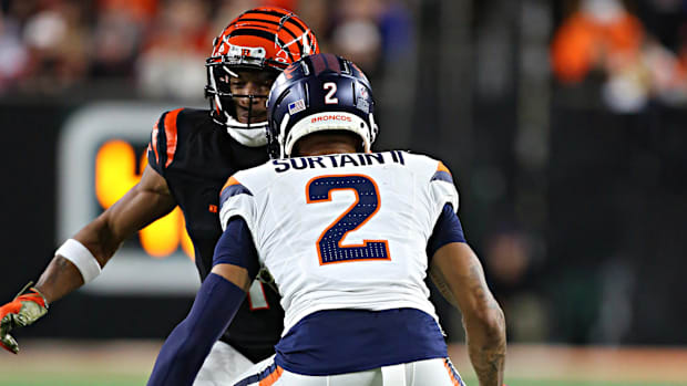 Denver Broncos cornerback Pat Surtain II (2) covers Cincinnati Bengals wide receiver Ja'Marr Chase (1).