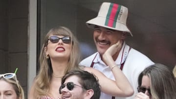 Sep 8, 2024; Flushing, NY, USA; Recording artist Taylor Swift and Kansas City Chiefs tight end Travis Kelce talk during the men’s singles final of the 2024 U.S. Open tennis tournament at USTA Billie Jean King National Tennis Center. 