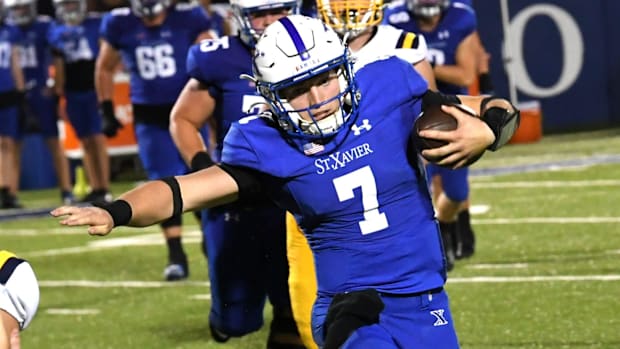 Quarterback Chase Herbstreit led St. Xavier past Elder on Friday.