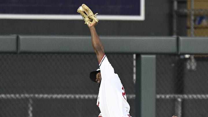 Jul 3, 2023; Minneapolis, Minnesota, USA;  Minnesota Twins outfielder Michael Taylor (2) makes a catch for an out against the Kansas City Royals during the seventh inning at Target Field. Mandatory Credit: Nick Wosika-Imagn Images