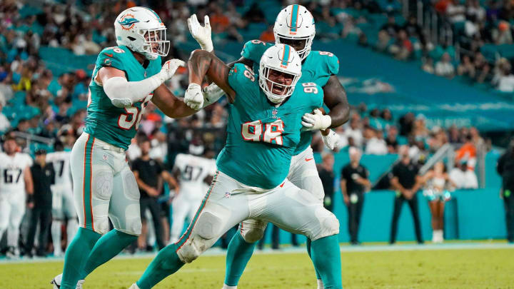 Miami Dolphins defensive tackle Brandon Pili (96) celebrates a tackle for loss during the fourth quarter of a preseason game at Hard Rock Stadium last season.