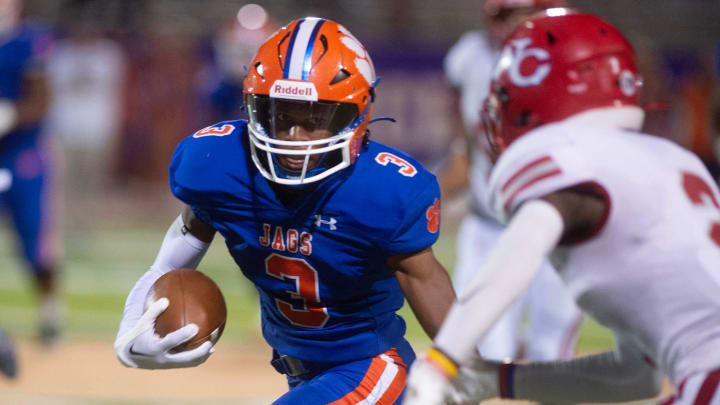 Madison Central's Jaiden Johnson (3) maneuvers around Warren Central's defense in Madison, Miss., Friday, Sept 22, 2023.