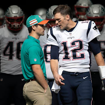 New England Patriots quarterback Tom Brady (12) leads his team onto the field at Hard Rock Stadium in Miami Gardens, Florida on December 9, 2018. [ALLEN EYESTONE/palmbeachpost.com]

Miami Dolphins Vs New England Patriots 1017633237