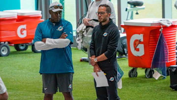 Miami Dolphins general manager Chris Grier and head coach Mike McDaniel watch training camp at Baptist Health Training Complex, Friday, July 28, 2023 in Miami Gardens.