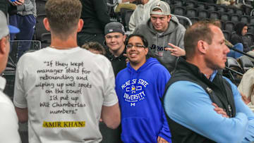 McNeese State legendary manager Amir Khan meets with fans before a game.  
