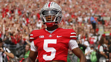 Ohio State Buckeyes wide receiver Garrett Wilson (5) catches a touchdown pass during the first half of the NCAA football game against the Oregon Ducks at Ohio Stadium in Columbus on Saturday, Sept. 11, 2021.

Oregon Ducks At Ohio State Buckeyes Football