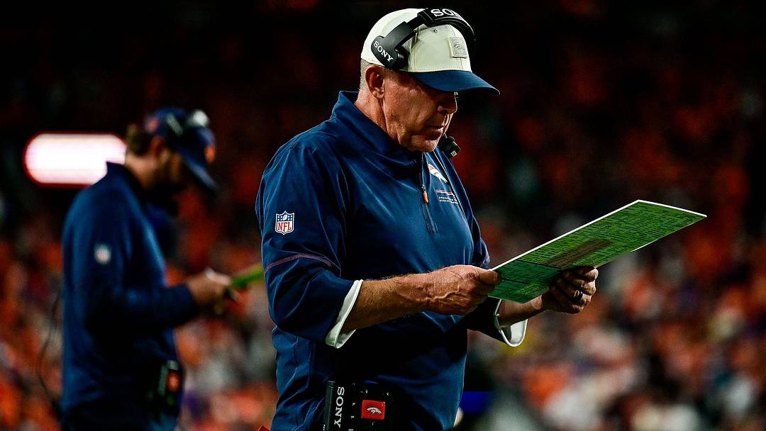 DENVER, CO - SEPTEMBER 27: Denver Broncos head coach Sean Payton looks over plays in the fourth quarter during a game between the Los Angeles Rams and the Denver Broncos at Empower Field at Mile High on September 27, 2026 in Denver, Colorado. 