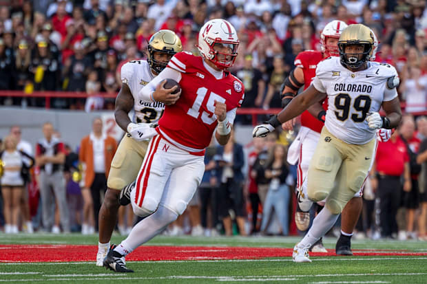 Nebraska quarterback Dylan Raiola scrambles for a 12-yard gain in the first quarter against Colorado.