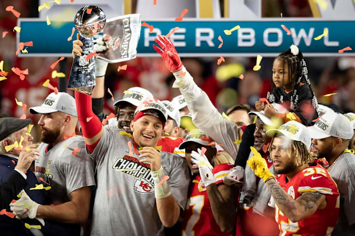 Kansas City Chiefs quarterback Patrick Mahomes celebrates with the Vince Lombardi Trophy. 