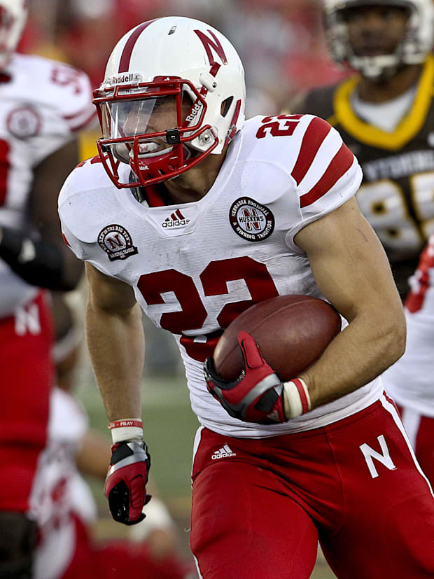Nebraska Cornhuskers running back Rex Burkhead runs the ball against the Wyoming Cowboys.