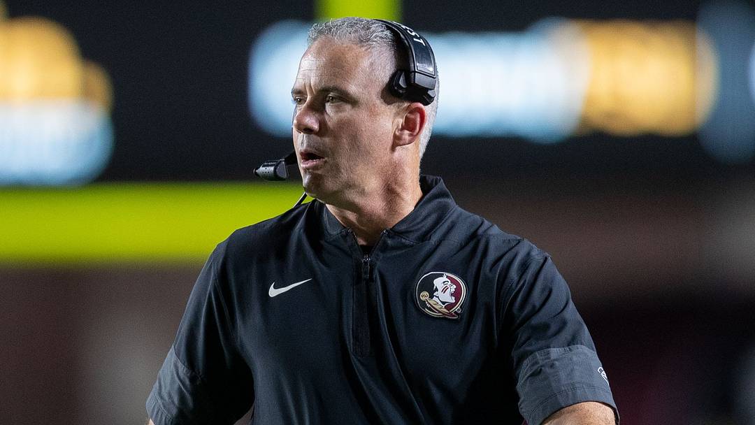 Florida State Seminoles head coach Mike Norvell talks into his headset during a timeout. The Florida State Seminoles defeated the New Mexico State Aggies 34-17 at Doak Campbell Stadium on Saturday, Aug. 29, 2026. Florida State Seminoles head coach Mike Norvell talks into his headset during a timeout. The Florida State Seminoles defeated the New Mexico State Aggies 34-17 at Doak Campbell Stadium on Saturday, Aug. 29, 2026.