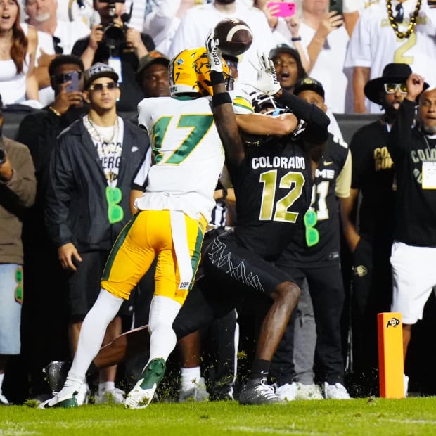 Colorado Buffaloes wide receiver Travis Hunter (12) pulls in a touchdown reception past North Dakota State Bison