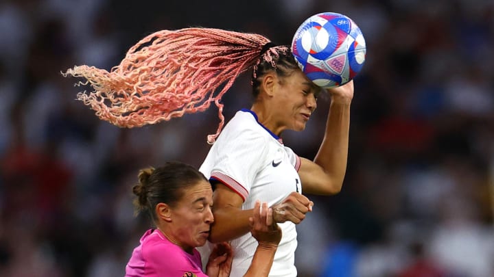 Jul 28, 2024; Marseille, France: Trinity Rodman of United States in action with Felicitas Rauch of Germany in a Group B match during the Paris 2024 Olympic Summer Games at Orange Velodrome.