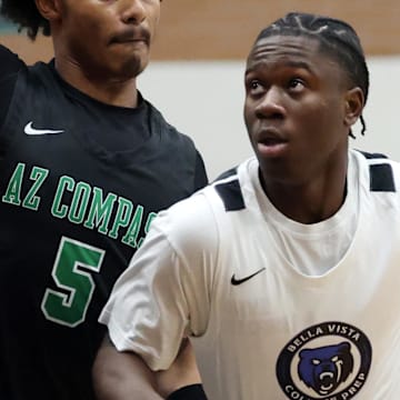 Jan 3, 2025; Gilbert, AZ, USA; Arizona Compass Prep  guard Kalek House (5) against CIA Bella Vista (AZ) guard Miles Sadler (1) during the Hoophall West High School Invitational at Highland High School. Mandatory Credit: Mark J. Rebilas-Imagn Images