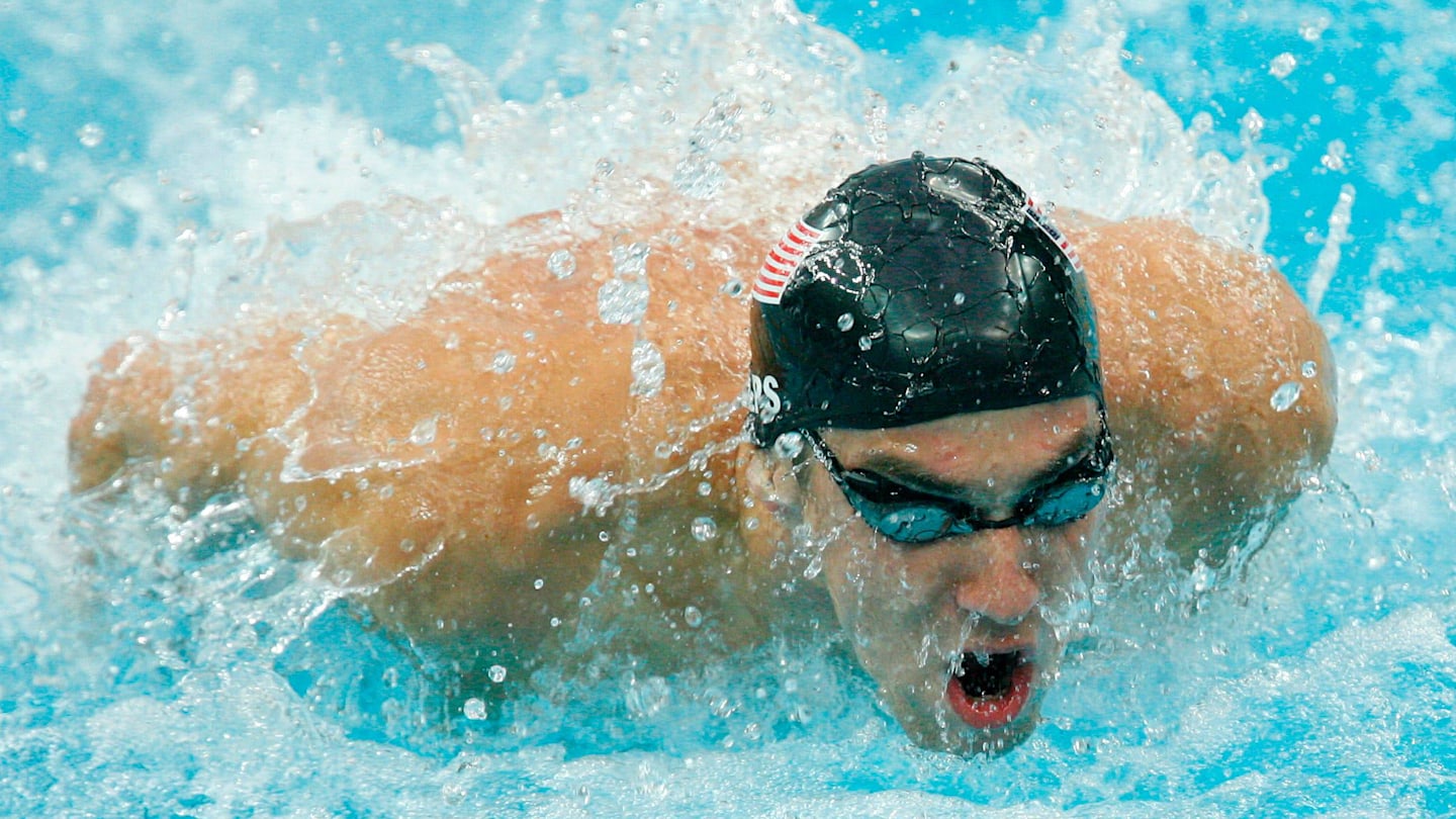 Olympic Legend Finishes Promise to Baltimore Ravens