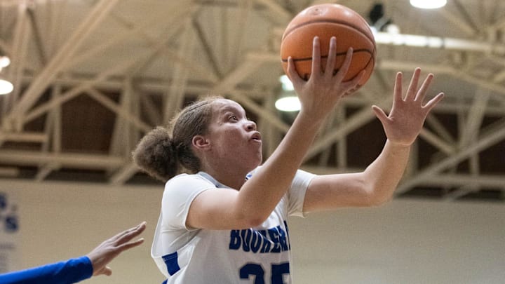 Chamiah Francis (25) takes it to the hoop during the Ridgeview vs Washington girls 5A Regional Semifinals basketball game at Booker T. Washington High School in Pensacola on Monday, Feb. 19, 2024.