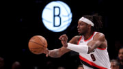 Jan 7, 2024; Brooklyn, New York, USA; Portland Trail Blazers forward Jerami Grant (9) passes the ball against the Brooklyn Nets during the fourth quarter at Barclays Center. Mandatory Credit: Brad Penner-USA TODAY Sports