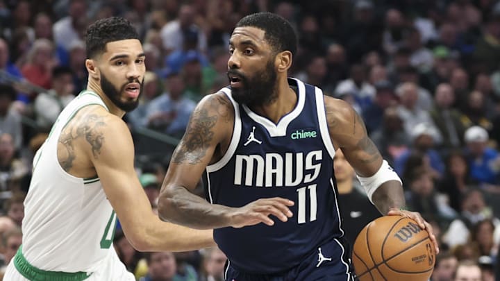 Jan 25, 2025; Dallas, Texas, USA; Dallas Mavericks guard Kyrie Irving (11) drives to the basket as Boston Celtics forward Jayson Tatum (0) defends during the first half at American Airlines Center. Mandatory Credit: Kevin Jairaj-Imagn Images Jan 25, 2025; Dallas, Texas, USA; Dallas Mavericks guard Kyrie Irving (11) drives to the basket as Boston Celtics forward Jayson Tatum (0) defends during the first half at American Airlines Center. Mandatory Credit: Kevin Jairaj-Imagn Images
