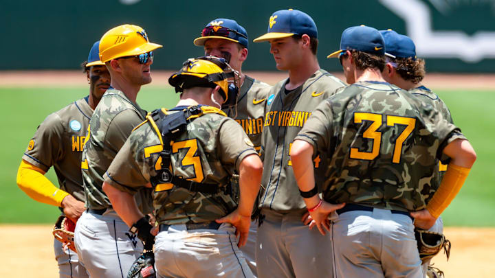 West Virginia Head Coach Steve Sabins visits the mound as The LSU Tigers take on the West Virginia Mountaineers in game 1 of the 2025 NCAA Div 1 Super Regional Baseball Championship at Alex Box Stadium in Baton Rouge, LA. Saturday, June 7, 2025.