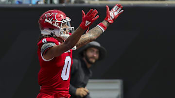 Sep 17, 2022; Cincinnati, Ohio, USA; Miami Redhawks wide receiver Mac Hippenhammer (0) celebrates