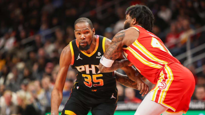 Feb 2, 2024; Atlanta, Georgia, USA; Phoenix Suns forward Kevin Durant (35) drives on Atlanta Hawks forward Saddiq Bey (41) in the first quarter at State Farm Arena. Mandatory Credit: Brett Davis-USA TODAY Sports