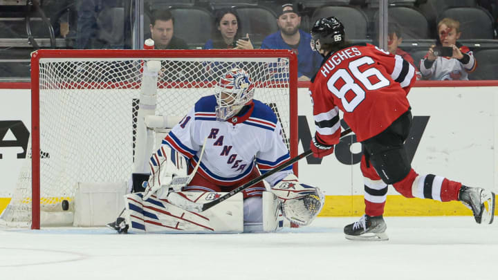 New Jersey Devils center Jack Hughes (86) scores on a penalty shot past New York Rangers goaltender Igor Shesterkin (31): Vincent Carchietta-USA TODAY Sports