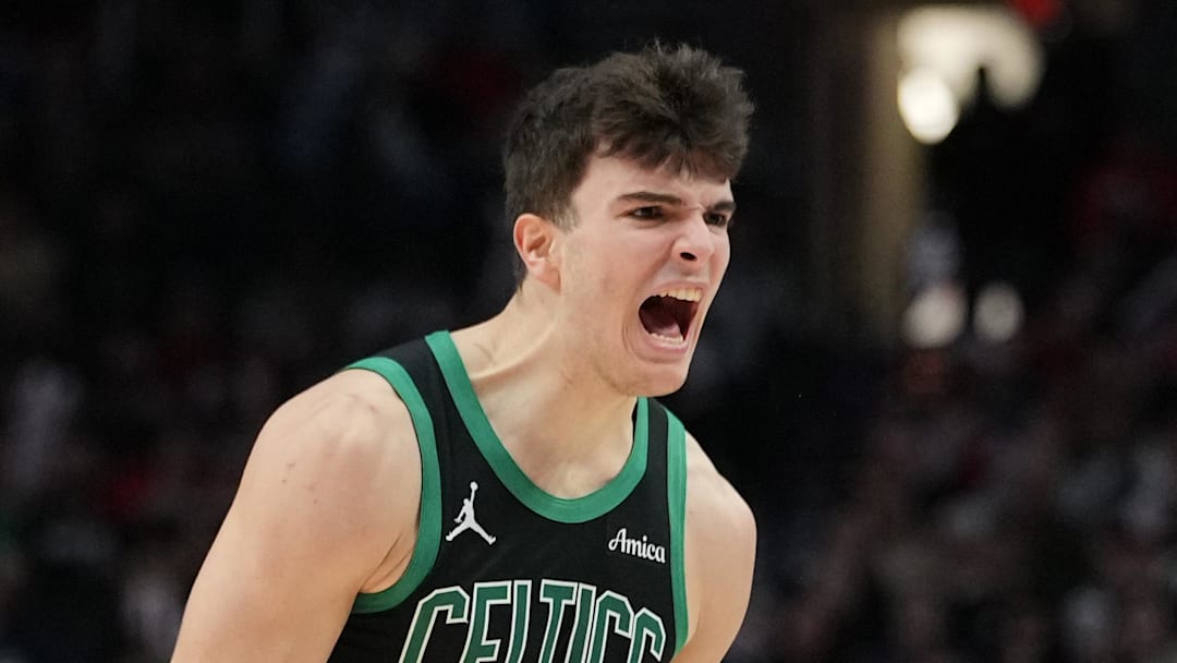 Dec 28, 2025; Portland, Oregon, USA; Boston Celtics guard Hugo Gonzalez (28) celebrates after making a three-point basket during the second half against the Portland Trail Blazers at Moda Center. Mandatory Credit: Soobum Im-Imagn Images