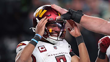 Jan 26, 2025; Philadelphia, PA, USA; Washington Commanders quarterback Jayden Daniels (5) celebrates after a play against the Philadelphia Eagles during the second half in the NFC Championship game at Lincoln Financial Field. Mandatory Credit: Bill Streicher-Imagn Images