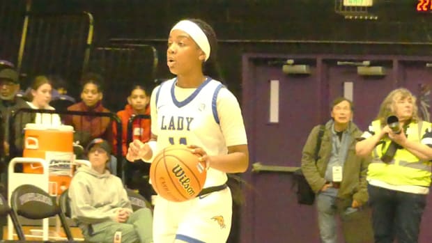 Abrianna Lawrence dribbling