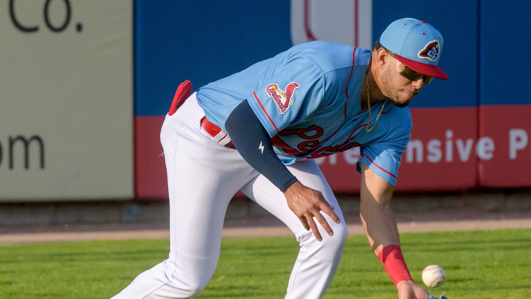 Peoria Chiefs outfielder Joshua Baez fields a hit to left field during a game against the Michigan Whitecaps on Wednesday, May 15, 2024 at Dozer Park in Peoria. Peoria Chiefs outfielder Joshua Baez fields a hit to left field during a game against the Michigan Whitecaps on Wednesday, May 15, 2024 at Dozer Park in Peoria.