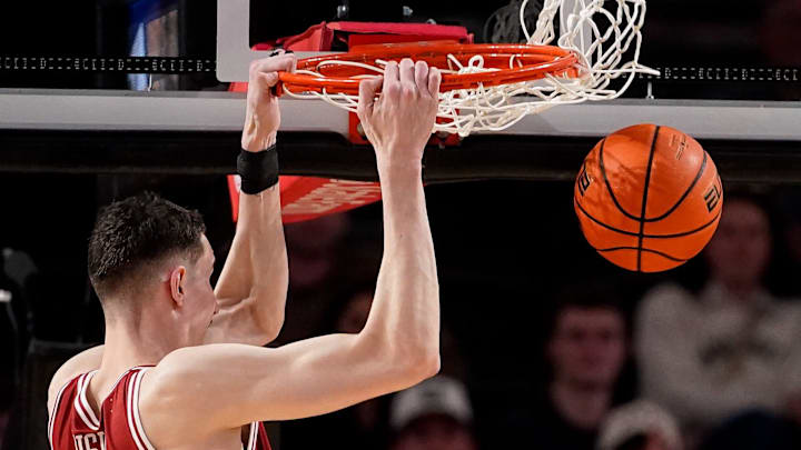Arkansas forward Zvonimir Ivisic (44) dunks against Vanderbilt during the first half at Memorial Gym in Nashville, Tenn., Tuesday, March 4, 2025. Arkansas forward Zvonimir Ivisic (44) dunks against Vanderbilt during the first half at Memorial Gym in Nashville, Tenn., Tuesday, March 4, 2025.