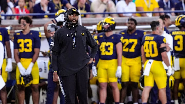 Moore is coaching Michigan without a contract in hand.