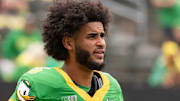 Oregon quarterback Dante Moore warms up as the Oregon Ducks host the Oklahoma State Cowboys on Sept. 6, 2025, at Autzen Stadium in Eugene, Oregon.