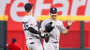 Jul 19, 2025; Atlanta, Georgia, USA; New York Yankees left fielder Cody Bellinger (35) and center fielder Trent Grisham (12) celebrate after a victory over the Atlanta Braves in the ninth inning at Truist Park. Mandatory Credit: Brett Davis-Imagn Images