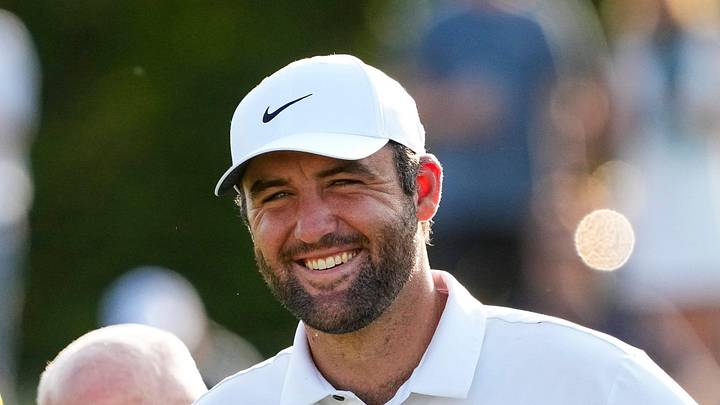 Scottie Scheffler laughs at a comment by Jack Nicklaus on hole No. 18 after the final round of the 2025 Memorial Tournament