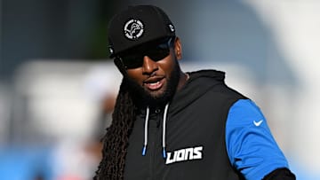 Jul 28, 2025; Allen Park, MI, USA;  Detroit Lions defensive coordinator Kelvin Sheppard watches over his players as they stretch during training camp at Meijer Performance Center.