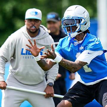 Detroit Lions wide receiver Jameson Williams makes a a catch at practice during OTAs 