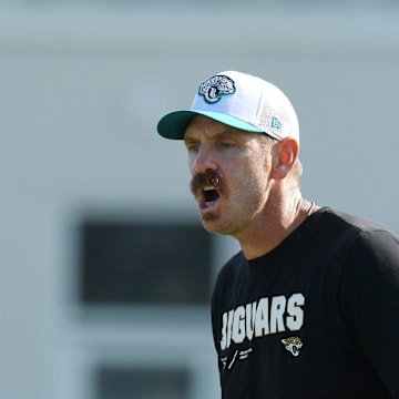 Jaguars defensive coordinator Ryan Nielsen talks with his players during the fourth day of the NFL football training camp practice session Saturday, July 27, 2024 at EverBank Stadium's Miller Electric Center in Jacksonville, Fla. [Bob Self/Florida Times-Union]