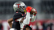 Auburn target Anquon Fegans intercepts the ball n the Class 7A football state championship.