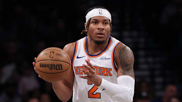 Apr 13, 2025; Brooklyn, New York, USA;  New York Knicks guard Miles McBride (2) dribbles up court during the first half against the Brooklyn Nets at Barclays Center. Mandatory Credit: Vincent Carchietta-Imagn Images