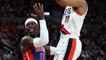 Mar 9, 2025; Portland, Oregon, USA;  Detroit Pistons guard Dennis Schroder (17) reacts after being called for a foul against Portland Trail Blazers guard Scoot Henderson (00) in the first half at Moda Center. Mandatory Credit: Jaime Valdez-Imagn Images