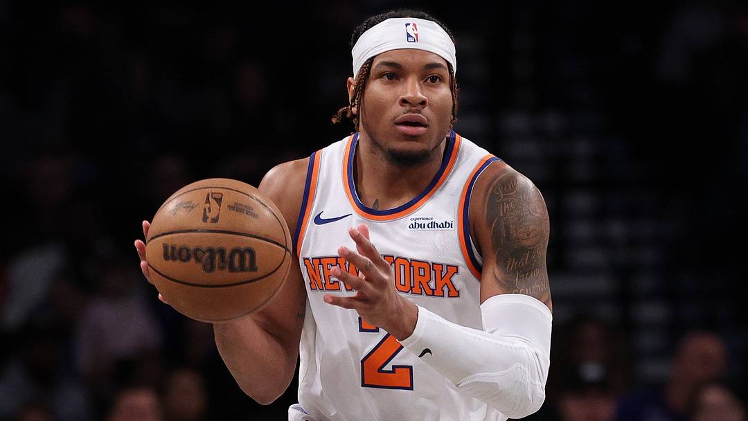 Apr 13, 2025; Brooklyn, New York, USA;  New York Knicks guard Miles McBride (2) dribbles up court during the first half against the Brooklyn Nets at Barclays Center. Mandatory Credit: Vincent Carchietta-Imagn Images