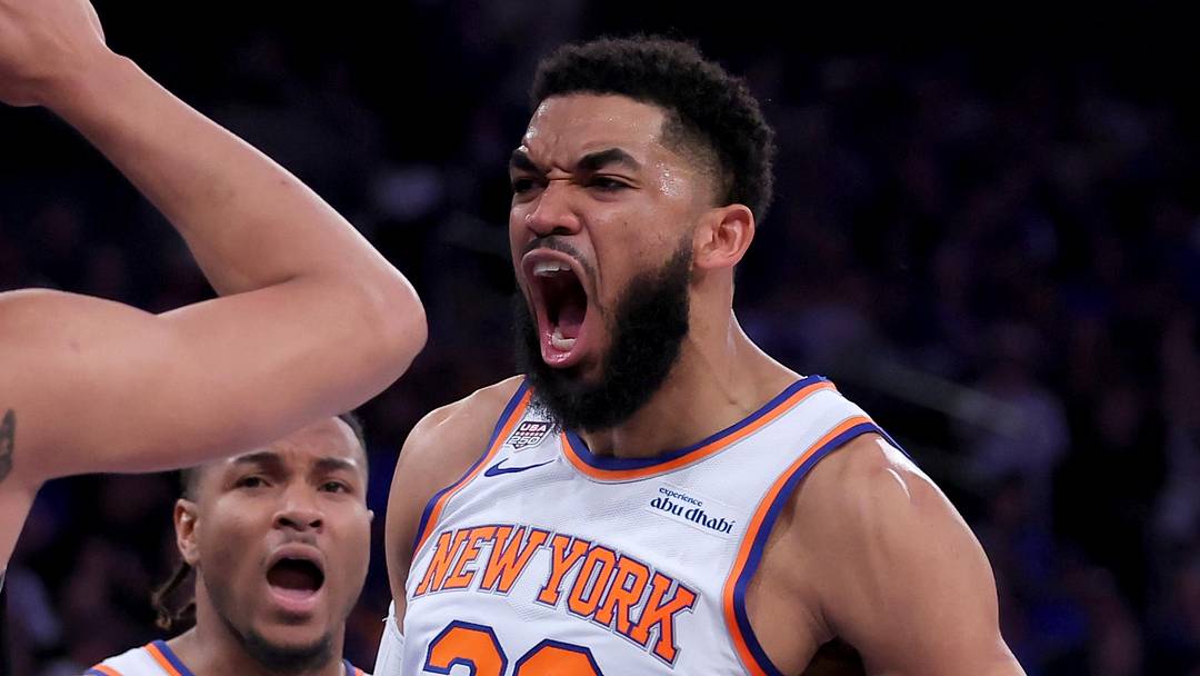 Jun 10, 2026; New York, New York, USA; New York Knicks center Karl-Anthony Towns (32) reacts against San Antonio Spurs forward Carter Bryant (11) during the second quarter of game four of the 2026 NBA Finals at Madison Square Garden. Mandatory Credit: Brad Penner-Imagn Images