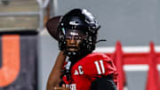 Sep 27, 2025; Raleigh, North Carolina, USA; North Carolina State Wolfpack quarterback CJ Bailey (11) throws the football during the first half of the game against Virginia Tech Hokies at Carter-Finley Stadium. Mandatory Credit: Jaylynn Nash-Imagn Images