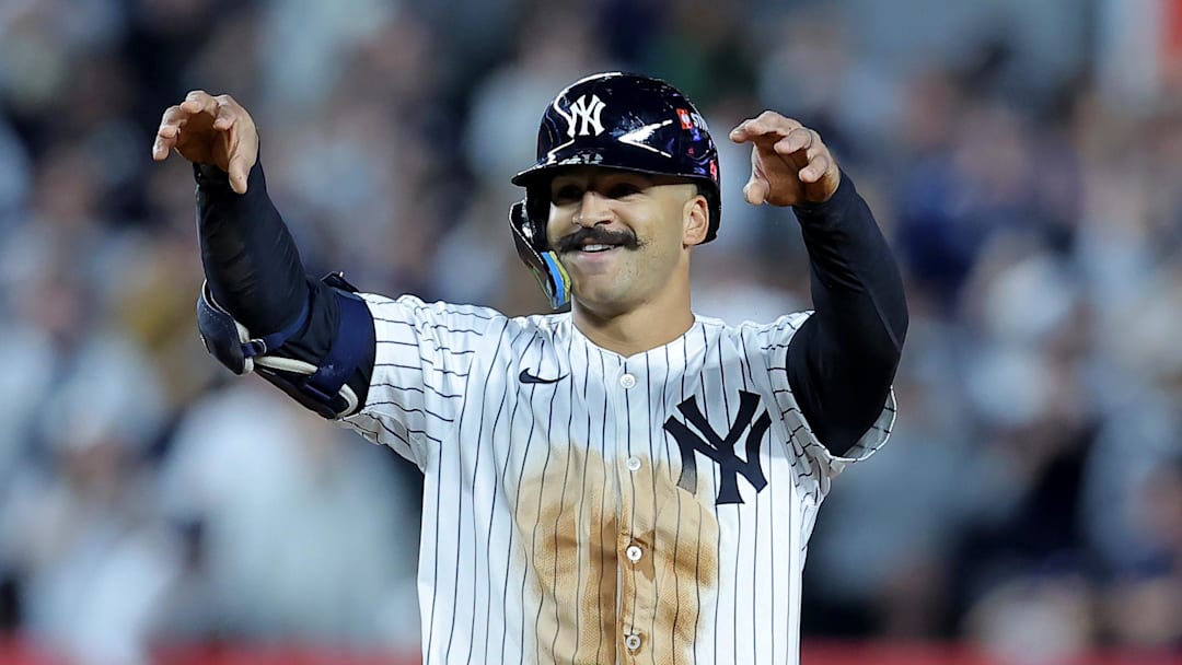 Oct 1, 2025; Bronx, New York, USA; New York Yankees center fielder Trent Grisham (12) celebrates his double against the Boston Red Sox during the seventh inning of game two of the Wildcard round of the 2025 MLB playoffs at Yankee Stadium. Mandatory Credit: Brad Penner-Imagn Images