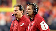 Jan 11, 2016; Glendale, AZ, USA; Alabama Crimson Tide defensive coordinator Kirby Smart (near) and head coach Nick Saban against the Clemson Tigers in the 2016 CFP National Championship at University of Phoenix Stadium. 