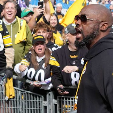 Sep 28, 2025; Dublin, Ireland; Pittsburgh Steelers coach Mike Tomlin interacts with fans during an NFL International Series game against the Minnesota Vikings at Croke Park. 